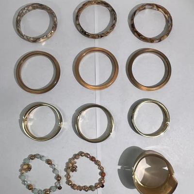 Variety Of Gold And Tan Toned Bracelets