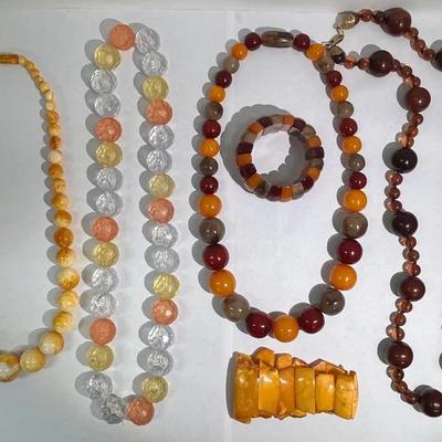 Orange And Yellow Bead Necklaces And Bracelets 
