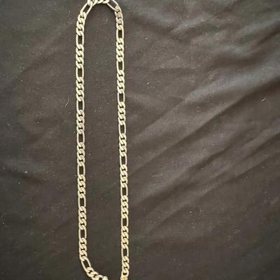 Lot 243: 24” Sterling Silver Figaro Chain 
