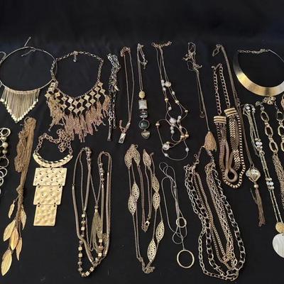 Lot 223: Gold Tone Costume Necklaces 