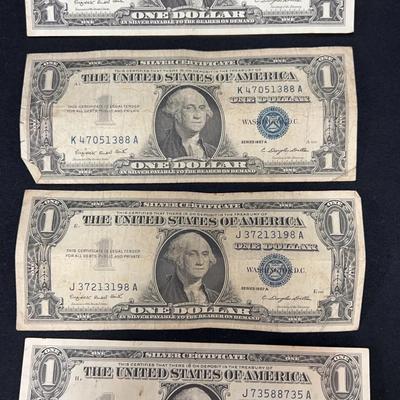 Lot 314: 4 $1 Silver Notes - 1957A
