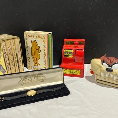 Taz Polaroid, Uncle Sam’s Register Bank, Tolkien Paperback Set, Pooh Books, Ninja Turtle Watch