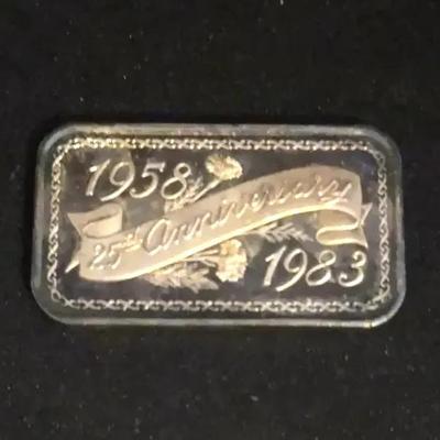  1oz Silver art bar commemorating a 25th anniversary from 1958 to 1983. 