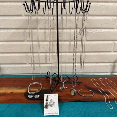 Collection of “925” Silver Pieces
Pendants are various gemstones 
Bracelet w/earrings “925 China”