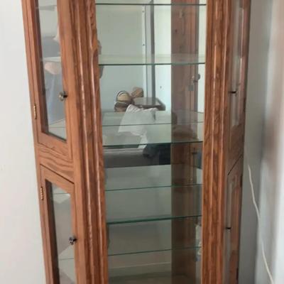 Lighted Oak Curio Cabinet with Mirrored Back