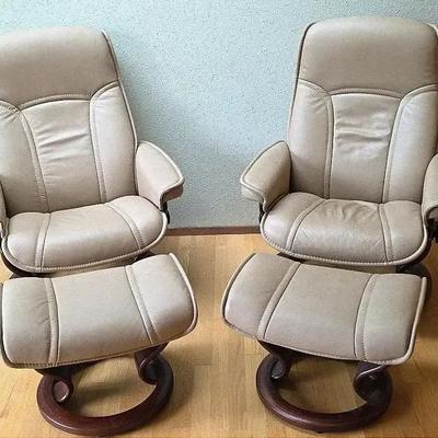 Two Leather Chairs with Ottomans 