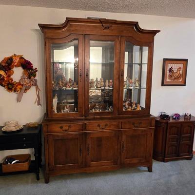 Sale Photo Thumbnail #47: China cabinet filled with Hummel figurines