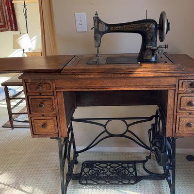 Antique Franklin Treadle Sewing Machine in Oak Cabinet