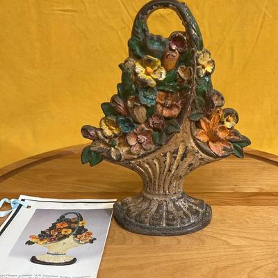 Antique A.M. Greenblatt Studios cast iron flower basket doorstop