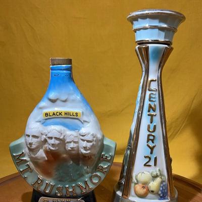 Collectible Jim Beam ceramic whiskey decanters: Mt. Rushmore and Century 21