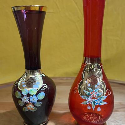 A pair of hand-painted enameled Bohemian glass vases with gold accents