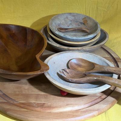 Vintage wooden salad bowl set with serving utensils