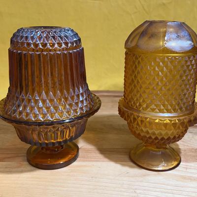 Two vintage amber glass Indiana Glass fairy lamps.