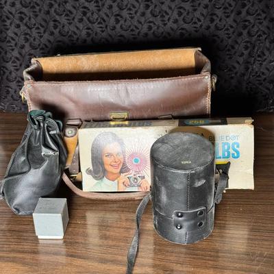 Vintage Camera Lenses And Blue Dot Bulbs