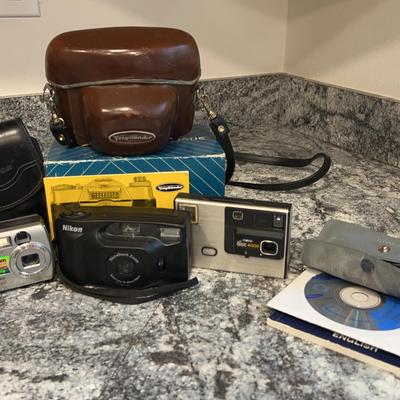 Cameras-Voigtlander Bessamatic, Nikon, Samsung, Kodak Disc 4000