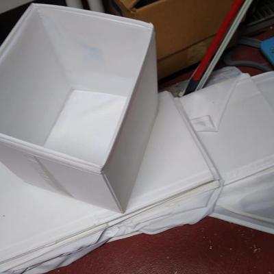 White collapsible cloth bins