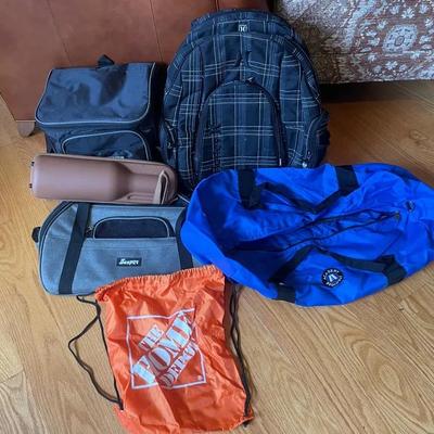 Lot Of Bags And A Backpack