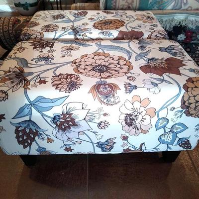 Two floral foot stools