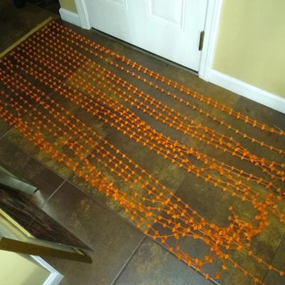 Orange doorway curtain