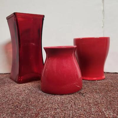 Three red vases