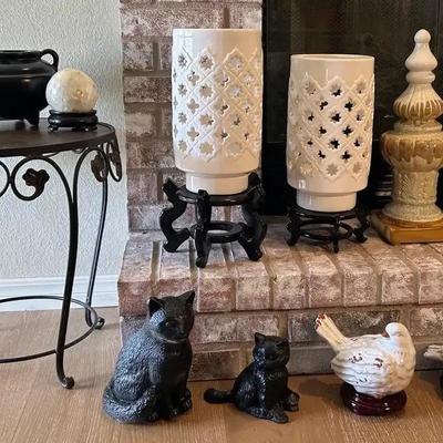 Tin Side Table (20”H x 18”diameter), Ceramic Statues(20”H x 7”diameter), Ceramic Candles(14”H x 7”d)