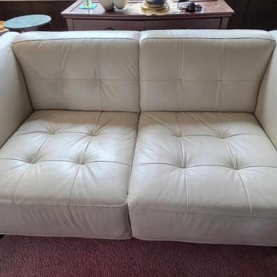 Cream Colored Leather Loveseat 