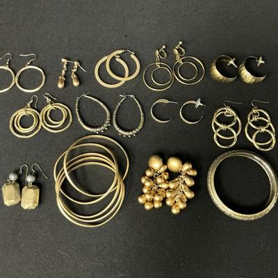Gold Toned Earrings And Bangles
