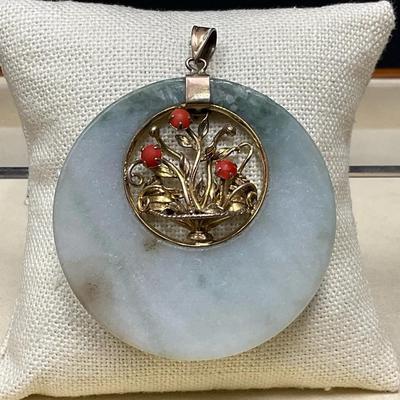 Round Jade Pendant With Ornate Gold Floral Setting 