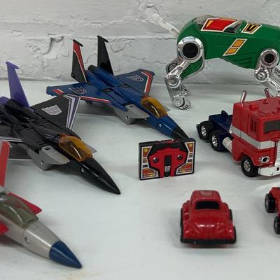1980s Transformer Toys With Accessories 