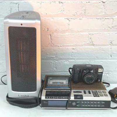 Small Electronics With GE Clock Radio, Lasko Fan And Minolta Freedom Zoom Camera 