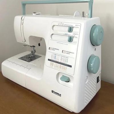 Kenmore Sewing Machine With Sewing Machine Cabinet and Portable Rolling Case 
