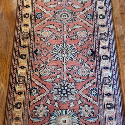 Oriental style runner length rug 
