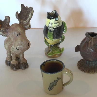Fish And Moose Figurines And A Mug For The Fisherman