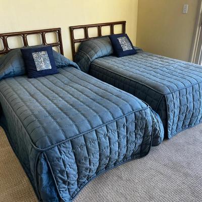Pair of Twin Beds with Blue Quilted Bedspreads & Bamboo-Style Headboards