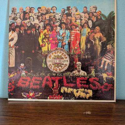 The Beatles – “Sgt. Pepper’s Lonely Hearts Club Band” LP (1967, Capitol Records)