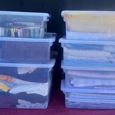 Bins Of Various Fabics For The Sewing Enthusiast