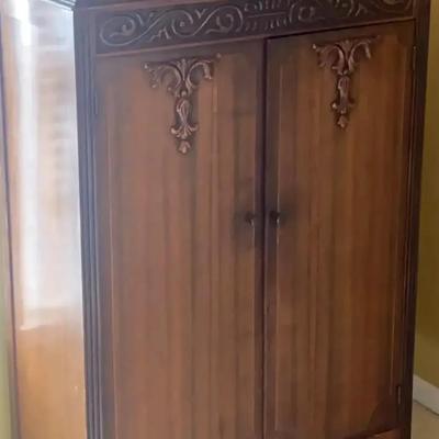Vintage Wooden Armoire with Ornate Trim