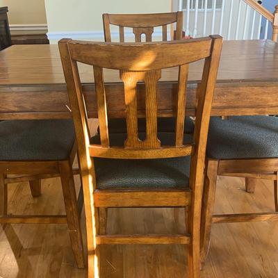 High-Top Wood Dining Table With Extension & Four Fabric-Cushioned Chairs