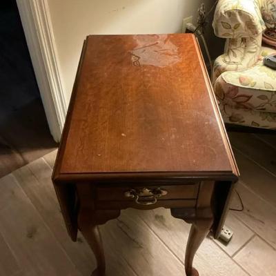 Queen Ann Style drop-leaf side table with cabriole legs and a single drawer