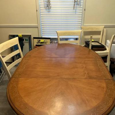 dining table in a natural wood finish And 4 Chairs