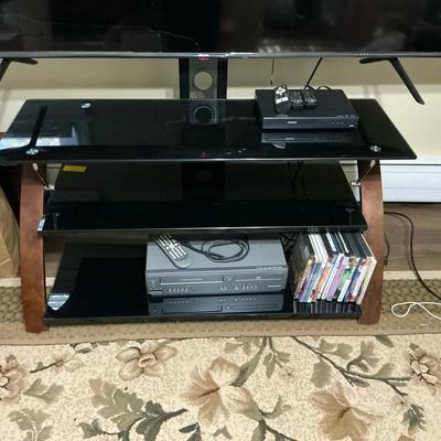 Multi-Tiered Glass TV Stand With Wood-Look Legs