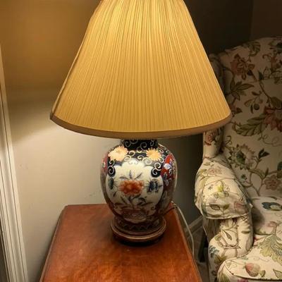 Decorative Ceramic Table Lamp With An Ornate, Colorful Floral Pattern