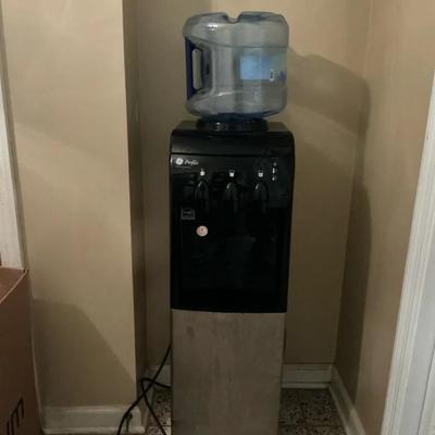 GE Profile Tri-Temp free-standing water dispenser with an integrated chilled compartment
