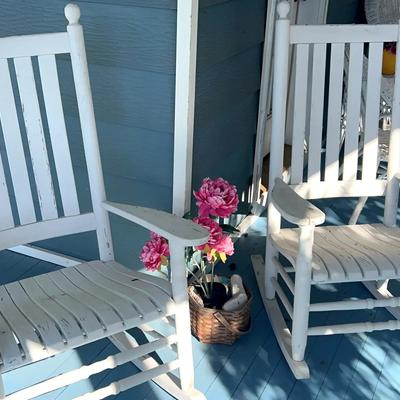 Pair of White Distressed Wood Rocking Chairs with Basket of Faux Flowers