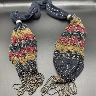 Antique Crocheted Miser Purse W/steel Beadwork
Lot #: 55