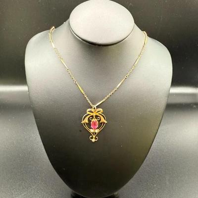 Vintage 10K Yellow Gold Lavalier Pendant W/ Pink Stone & Small Pearls On Gold Filled Chain- 1.28 Grams
Lot #: 3