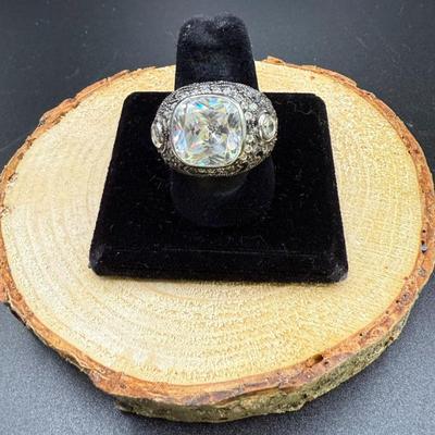 Large 925 Silver Fashion Ring With CZ's, Size 8 - 12.13 Grams
Lot #: 34
