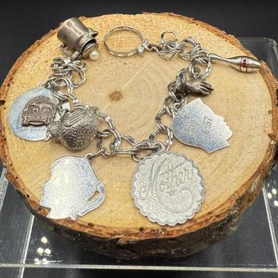 Vintage Mid-Century Sterling Silver Charm Bracelet W/Charms - 7" L
Lot #: 43