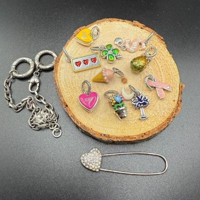 Brighton Silver Tone Purse Charm Holder With Multiple Brighton Charms & Brighton Rhinestone Heart Pin
Lot #: 84