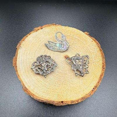 Lot (2) Art Nouveau-Style Sterling Silver Lady Pin/Pendants & 925 Silver Swan Pin W/ Abalone Inlay- 13.38 Gram
Lot #: 41